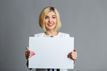 Image showing Photo of girl with paper