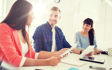 Image showing happy creative team or students working at office