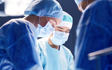 Image showing group of surgeons in operating room at hospital