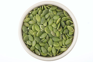 Image showing Shelled pumpkin seeds in a pot