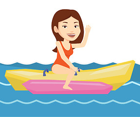 Image showing Tourists riding a banana boat vector illustration.