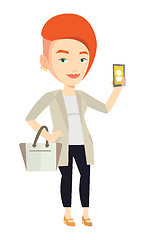 Image showing Woman holding ringing mobile phone.