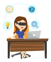 Image showing Business woman in vr headset working on computer.