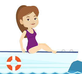 Image showing Young happy woman tanning on sailboat.