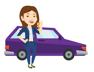 Image showing Woman holding keys to her new car.