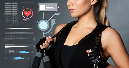 Image showing close up of sporty woman with jumping rope