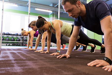 Image showing group of people exercising in gym