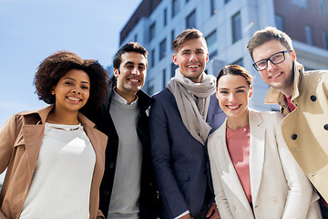 Image showing group of happy people or friends on city street