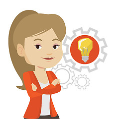 Image showing Woman with business idea bulb in gear.