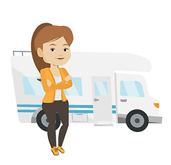 Image showing Woman standing in front of motor home.