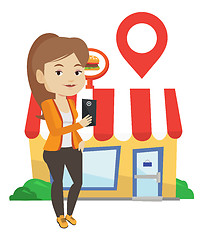 Image showing Woman looking for restaurant in her smartphone.