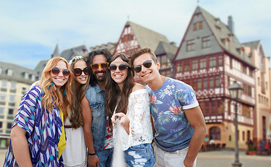 Image showing happy hippie friends taking selfie in frankfurt