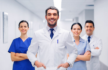 Image showing happy group of medics or doctors at hospital