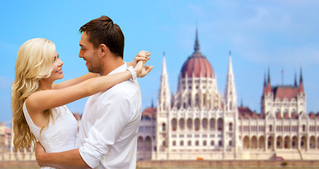 Image showing happy couple over house of parliament in budapest