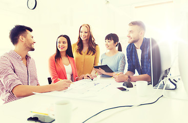 Image showing happy creative team or students working at office