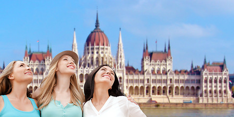 Image showing happy women over house of parliament in budapest