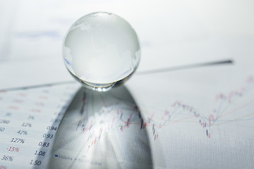 Image showing Glass globe on the chart paper