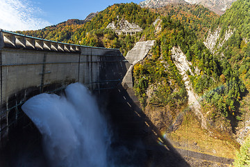 Image showing Kurobe Dam and rainbow in Autumn season