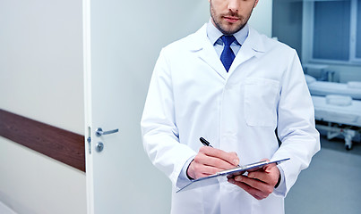Image showing doctor with clipboard at hospital
