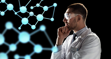 Image showing scientist looking at molecule projection