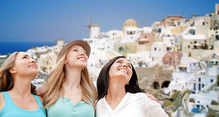 Image showing happy women over santorini island background