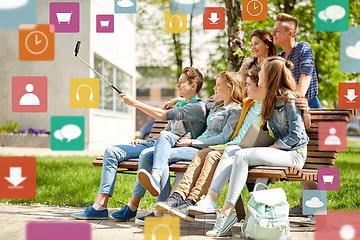 Image showing happy teenage students taking selfie by smartphone