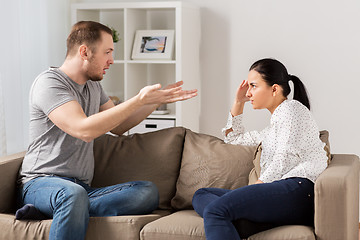 Image showing unhappy couple having argument at home