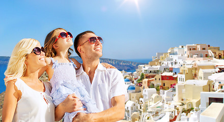 Image showing happy family over santorini island background