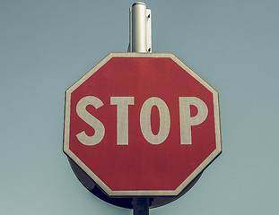 Image showing Vintage looking Stop sign over blue sky