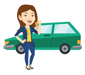 Image showing Woman holding keys to her new car.