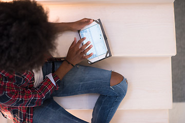 Image showing black woman using her electronic tablet