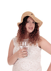 Image showing Woman holding glass with water.