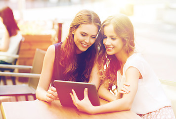Image showing happy young women or teenage girls with tablet pc