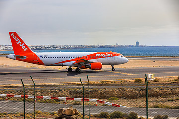 Image showing ARECIFE, SPAIN - APRIL, 15 2017: AirBus A319-100 of easyjet read