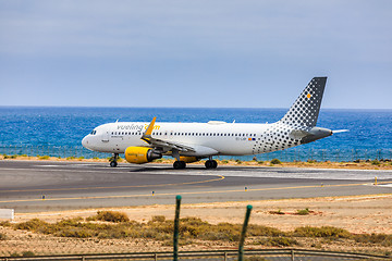 Image showing ARECIFE, SPAIN - APRIL, 15 2017: AirBus A320 of vueling.com with