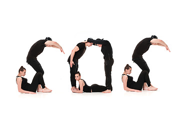 Image showing The word SOS formed by Gymnast bodies