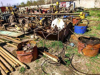 Image showing Metal waste products are stored in an open area
