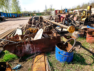 Image showing Metal waste products are stored in an open area