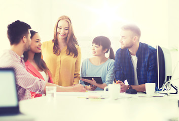 Image showing happy creative team or students working at office