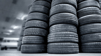 Image showing Stack of used car tires