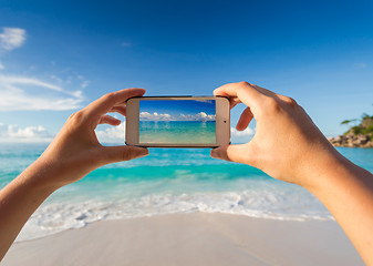 Image showing Taking a picture of the beach