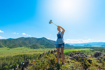 Image showing Woman taking selfie on mobile phone