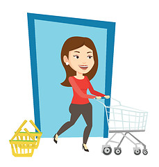 Image showing Customer running into the shop with trolley.