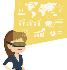 Image showing Businesswoman in vr headset analyzing virtual data