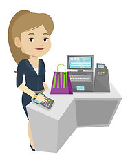 Image showing Woman paying wireless with smart watch.