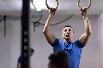 Image showing man doing dipping exercise