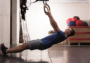 Image showing man doing dipping exercise