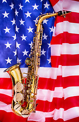 Image showing saxophone and USA flag