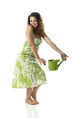 Image showing Woman with a watering can