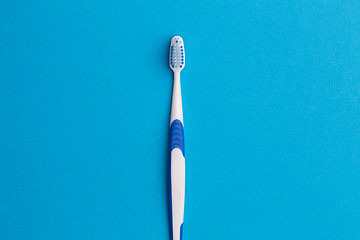 Image showing Photo of one blue toothbrush
